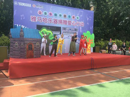 利来最给力的老牌乐器爱心捐赠行动在沈阳举办：与音乐牵手 随幸福成长